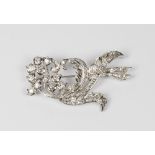 A white gold spray brooch set diamonds to flower and leaves
