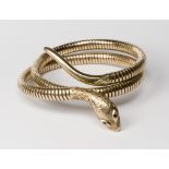 An 18ct. gold mesh bracelet in the form of a snake with ruby set eyes