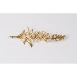 A 9ct. gold fern leaf style brooch set seed pearls