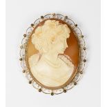 A lady's carved shell cameo brooch depicting head and shoulders of a lady, in a 9ct. gold frame with
