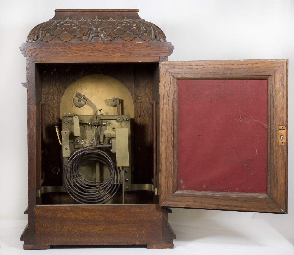 A Victorian bracket clock with arched brass dial pierced to mask design, silvered chapter ring, - Image 2 of 5