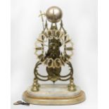 A 19th Century brass skeleton clock in the Gothic style with fusee movement striking on a bell, on a