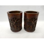 A pair of bamboo brush pots with carved decoration of figures, pavillions and gardens - 7 1/4in.