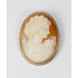 A carved shell cameo brooch depicting head and shoulders of a lady, in a 9ct. gold frame with