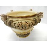 A large Royal Worcester blue ivory jardiniere with reticulated oval side panels and mounted with
