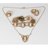 A suite of 9ct. gold and cameo set jewellery comprising:- ring, bracelet, pendant on chain and a