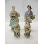 A pair of 19th Century Derby style porcelain figures of putti - 5in. high and a pair of late 19th