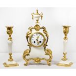 A 19th Century French mantel clock with white enamel dial, in a white marble case with urn