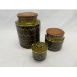 A selection of Hornsea Heirloom green and black storage jars