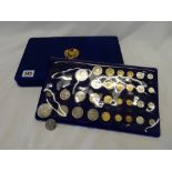 A set of Royal Thai Mint coins in fitted blue silk covered box