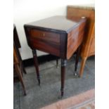 A mahogany Pembroke table fitted two drop flaps, end drawer, on turned legs - 18in. wide