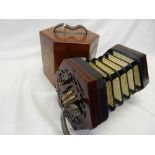 A concertina by Lachenal and Co. of London, numbered 46527, in original mahogany carrying case