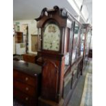 A 19th Century longcase clock with cream enamel dial painted flowers to the arch, seconds dial,