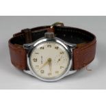 A Revue military issue wristwatch in a chrome case, on a leather strap