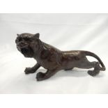 A Japanese bronze model of a snarling tiger - 12in. long