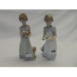 Two Lladro figures of a girl with a plate and piece of cake and a girl with a telephone - 8in. high