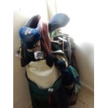 A golf bag containing nine Ping golf clubs and various other golf clubs including Callaway etc..