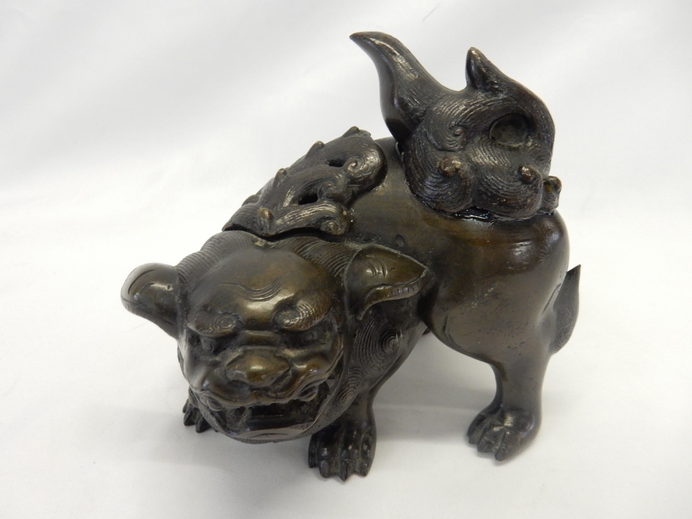 A bronze model of a Chi Chi dog - 6in. high