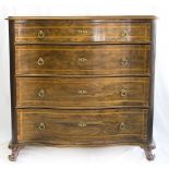 A Continental walnut and satinwood inlaid chest with serpentine shaped front, fitted four drawers,