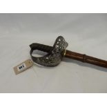 A Victorian military sword with pierced basket hilt, shagreen handle, in brown leather scabbard