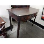 A 19th Century mahogany sidetable with bow front, fitted two drawers with turned wood knob