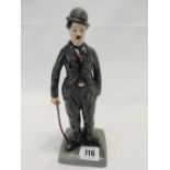 A Royal Doulton limited edition figure - Charlie Chaplin HN 2777, no.1679 of 5000 - 9 1/2in. high