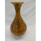 A Chinese vase of baluster form decorated mythical animals and floral embossed decoration - 15in.