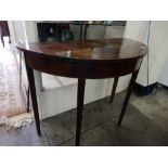 A 19th Century mahogany sidetable with half round top, on square legs - 36in. wide