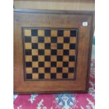 An early 20th Century large oak chessboard