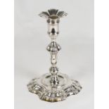 A George II silver taper stick, on scalloped base - London 1745 - 4 1/2in. high