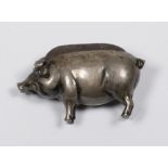 A silver pin cushion in the form of a pig - Birmingham 1907, makers mark for Adie and Lovekin