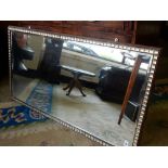 A 19th Century Irish style rectangular wall mirror with square glass border - 43in. x 22in.