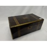 A 19th Century coromandel wood and brass bound travelling writing box, the interior with black and