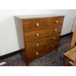 A 19th Century mahogany straight front chest fitted two narrow and three wide drawers, brass handles