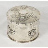 A Chinese cylindrical silver trinket box with all round decoration of chrysanthemums, makers mark