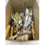 A selection of plated flatware including fiddle and Albany pattern, four berry spoons, table knives,