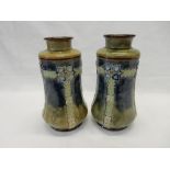 A pair of Royal Doulton vases, mottled blue and green with tube lined decoration of flowers and