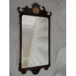 A Georgian design rectangular bevelled wall mirror in a mahogany frame with fretwork decoration