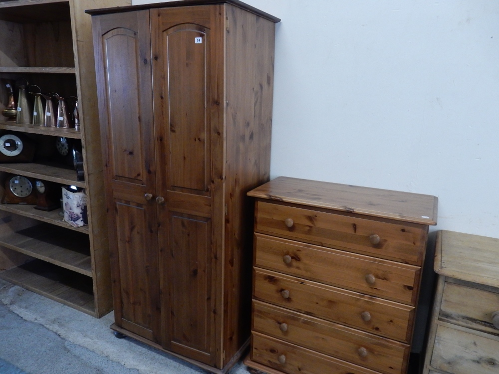 A modern three piece pine bedroom suite comprising:- chest fitted five drawers - 31in. wide,