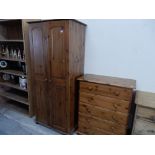 A modern three piece pine bedroom suite comprising:- chest fitted five drawers - 31in. wide,