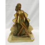 An Art Deco style tablelamp base in the form of a semi clad female, on stepped base - 25 1/2in.
