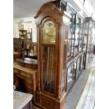 An Emperor reproduction longcase clock with brass dial, moonphase to the arch, three weights, in a