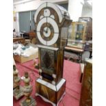 A reproduction illuminated miniature longcase clock in an imitation mother of pearl and