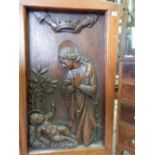 A carved oak panel depicting religious figures in relief - 25in. x 42in.