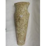 A studio pottery vase by Chris Carter, rough textured stone glaze, signed to the base with