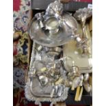 A selection of silver plated items including trays, flatware, candelabra, pair of candlesticks