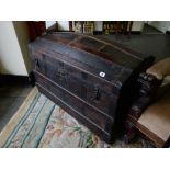 A 19th Century wood and canvas dome top trunk with semi fitted interior - 36in. wide