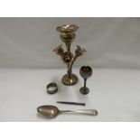 A silver coloured metal epergne with flower form supports, on circular base, a silver tulip shaped