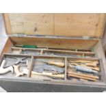 A stained pine tool chest - 36in. wide containing a quantity of wood working tools etc..