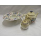 A collection of Poole Pottery floral decorated wares including bowls, plates, dishes etc..